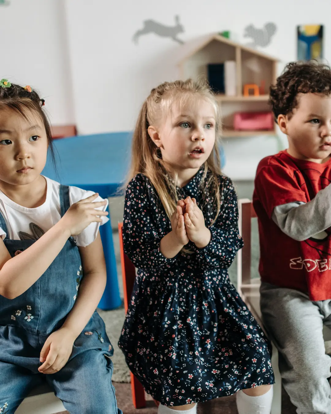 Diverse children in a nurturing setting